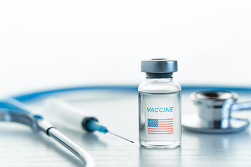 Transparent vial with USA,american flag.Vaccine for covid-19 coronavirus, flu,infectious...