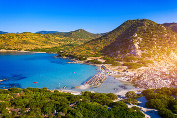 Obraz premium Cost of Sardinia: Peninsula of Punta Molentis. View of beautiful beach at Punta Molentis, Villasimius, Sardinia, Italy. Beautiful bay with sandy beach at Punta Molentis, Sardinia island, Italy.