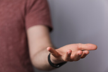 A man holding empty his hand