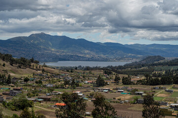 Fototapeta premium Beutiful view of a village with a blue lagoon in the background