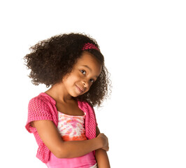 Smiling happy little girl with beautiful curly frizzy hair