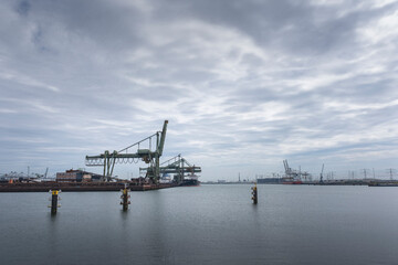Obraz premium Type of cargo terminal and cranes, berths for transshipment of bulk cargo, iron ore and coal