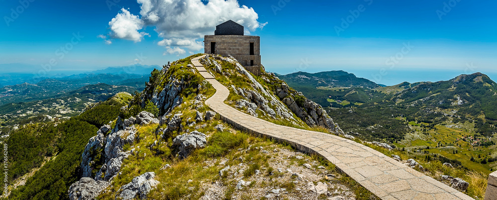 Wall mural view from mount jezerski vrh towards the town of cetinje, montenegro and the lovcen national park