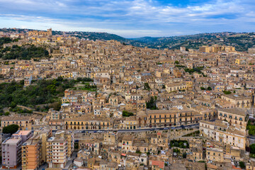 Fototapeta premium Aerial view of Modica, Sicily, Italy. Modica (Ragusa Province), view of the baroque town. Sicily, Italy. Ancient city Modica from above, Sicily, Italy