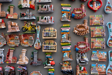 Multicolored decorative knick knacks hanging for display at hippy market.