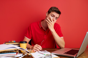 sad frustrated man is unhappy to have too muc work, need some rest and easier tasks from boss