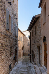 Narrow alley in tuscan village. antique italian lane, Tuscany, Italy