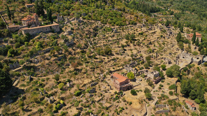 Aerial drone photo of medieval byzantine old city of Mystras featuring Monastery of Pantanassa,...