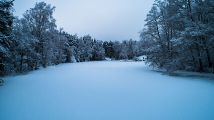winter ice and snow on lake in finland 
