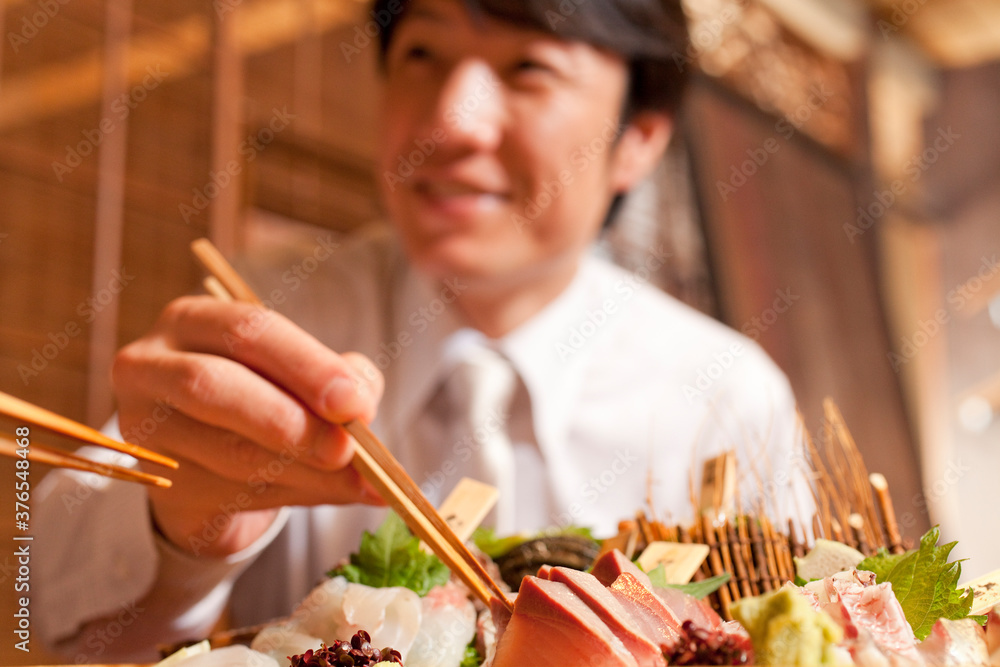 Poster お刺身を食べるビジネスマン