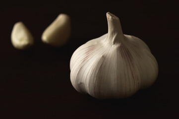 Close-up of garlic on a wooden table