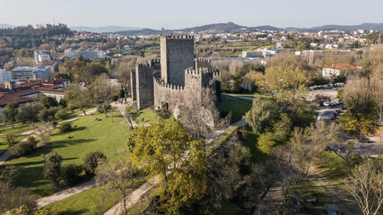 Fototapeta premium Aerial view of Guimarães castle, Portugal. Medieval stone castle in Guimarães