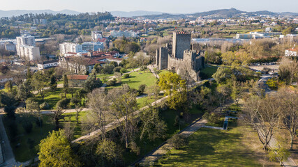 Obraz premium Aerial view of Guimarães castle, Portugal. Medieval stone castle in Guimarães