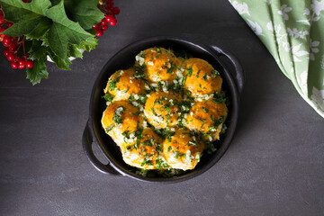 Buns Pampushky - Ukrainian garlic bread. Bread rolls with garlic and parsley. View from above, top studio shot