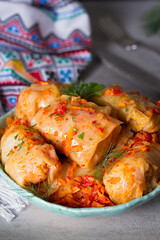 Cabbage rolls with meat, rice and vegetables. Chou farci, dolma, sarma, golubtsi or golabki