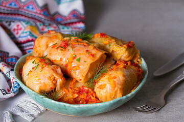 Cabbage rolls with meat, rice and vegetables. Chou farci, dolma, sarma, golubtsi or golabki