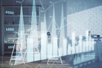 Double exposure of financial graph drawing and office interior background. Concept of stock market.