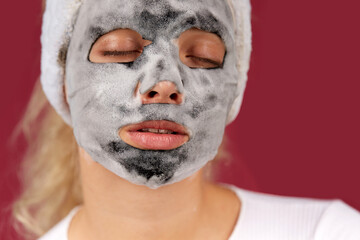 Woman cleaning face skin enjoy herself with bubble cleansing foam