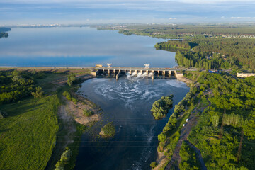 Obraz premium Hydroelectric dam or hydro power plant on river, aerial panoramic view.