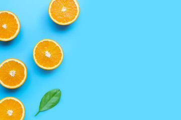 High vitamin C, Juicy and sweet. Fresh orange fruit  on blue background.