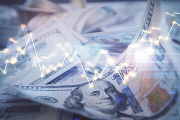 Double exposure of forex graph drawing over us dollars bill background. Concept of financial markets.