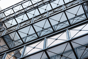 Fototapeta premium Metal mesh on steel walkways between buildings to communicate.