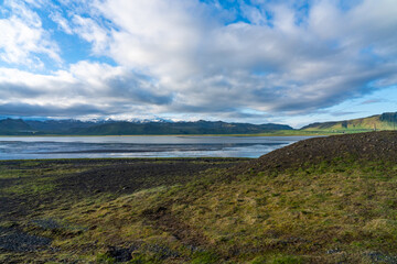 Gravel and mountain coastline in Iceland