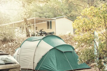 Tent and house