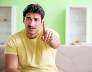 Young man at home after injury