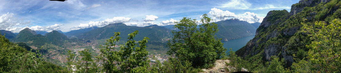 Fototapeta na wymiar Panoramic viuew on Riva del garda from mountain peak of monte colodri, italy