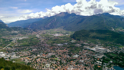 Fototapeta premium panoramic view on Riva del garda from mountain peak of cima d'oro