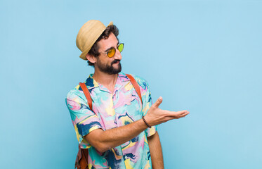 young bearded tourist man smiling, greeting you and offering a hand shake to close a successful...