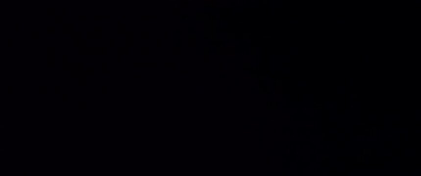 Single white feather falls in slow motion