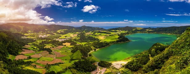 Fototapeta na wymiar Aerial view of Lagoa das Furnas located on the Azorean island of Sao Miguel, Azores, Portugal. Lake Furnas (Lagoa das Furnas) on Sao Miguel, Azores, Portugal from the Pico do Ferro scenic viewpoint.