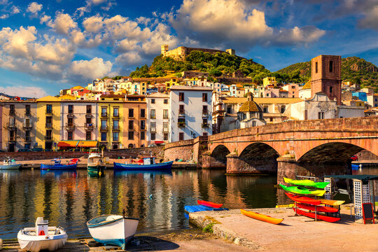 Beautiful view of Bosa town, Sardinia island, Italy. Travel destination. Bosa town with Ponte Vecchio bridge across the Temo river. Marvelous morning view of Sardinia island, Italy, Europe.