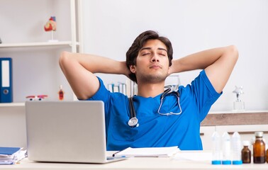 Young doctor working in the hospital