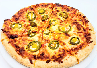 Homemade pizza ; Jalapenos pickle on cheese pizza crust on white plate in white background
