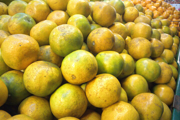 Orange pile in market store