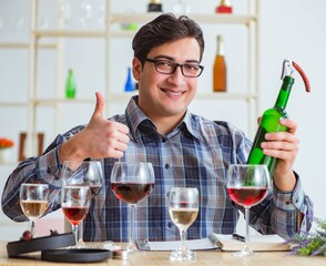 The professional sommelier tasting red wine