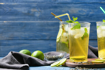 Glasses of tasty cold ice tea on table