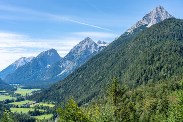 Fototapeta na wymiar view on wetterstein mountains and leutasch valley from ederkanzel guest court restaurant in summer