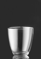 Empty glass on dark background