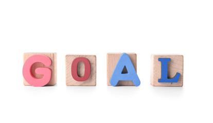 Wooden cubes with word GOAL on white background