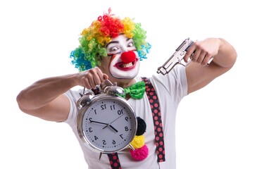 Funny clown with an alarm clock isolated on white background