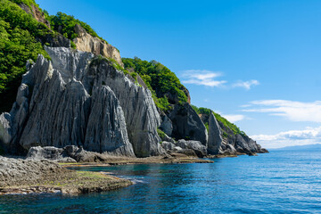 Naklejka premium 【青森県下北半島佐井村】 一ツ仏:仏ヶ浦は緑色凝灰岩がつくる大小さまざまな奇岩が集まり極楽浄土の景観
