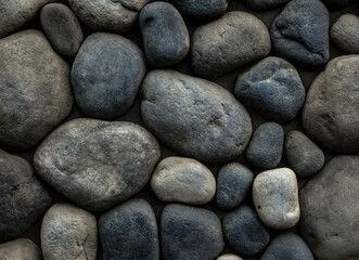 Stone background. Wall of rounded pebbles.