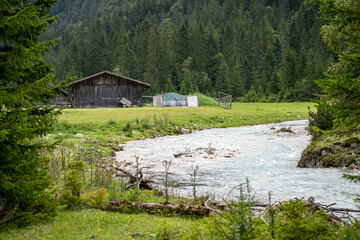 Fototapeta na wymiar view on isar river and mountains near the isar origin in scharnitz, austria
