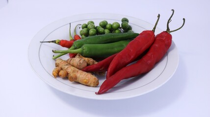 red and green chili peppers with turmeric solanum ningrum leunca