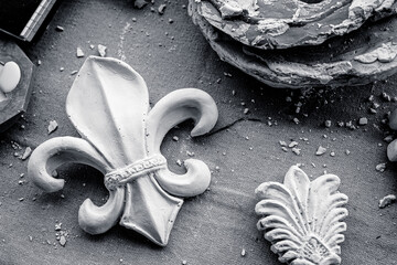 Plaster fleur de lis architectural decor © Laura Faye