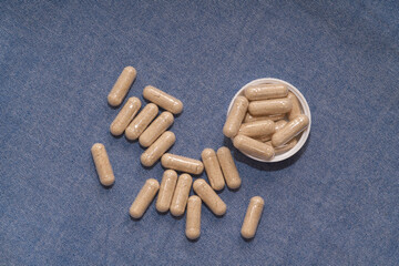 vegetarian capsules laid on white table isolated © avrezn